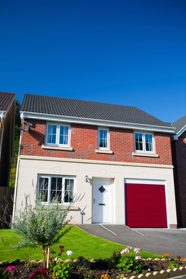 Red garage door on house - JB Garage Doors