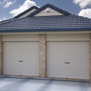 Double white roller garage door - JB Garage Doors