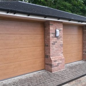 Double wooden sectional garage doors - JB Garage Doors