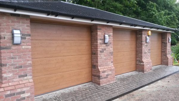 Double wooden sectional garage doors - JB Garage Doors