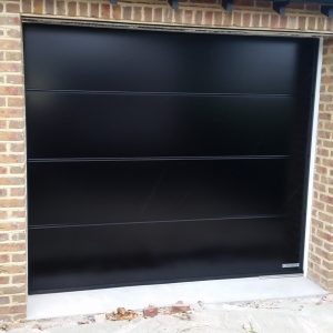 Single black Garador garage door - JB Garage Doors