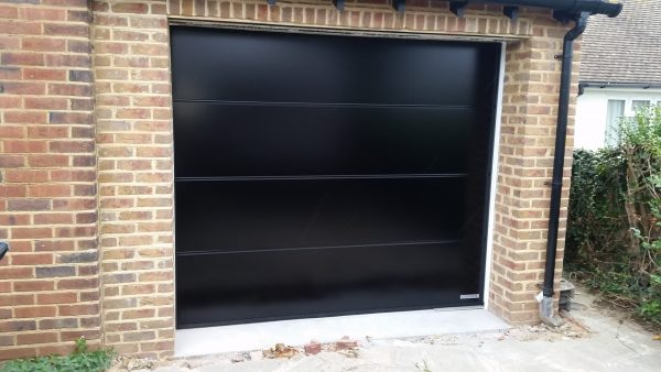 Single black Garador garage door - JB Garage Doors