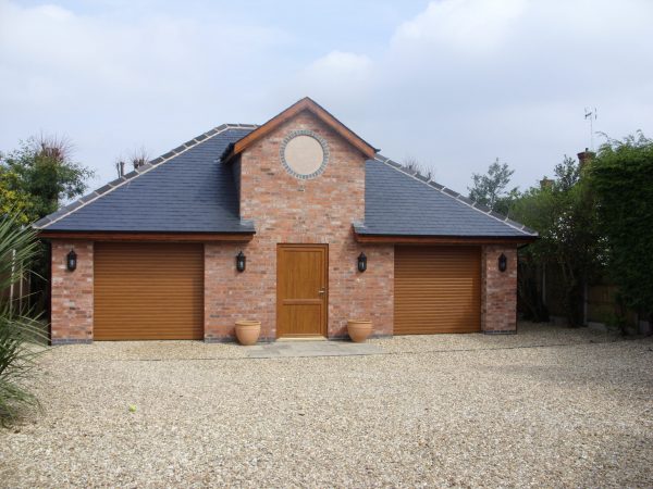 Double wooden SWS UK garage doors - JB Garage Doors