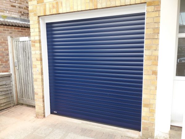 Single blue garage door services - JB Garage Doors
