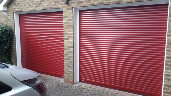 Double red garage door about us - JB Garage Doors