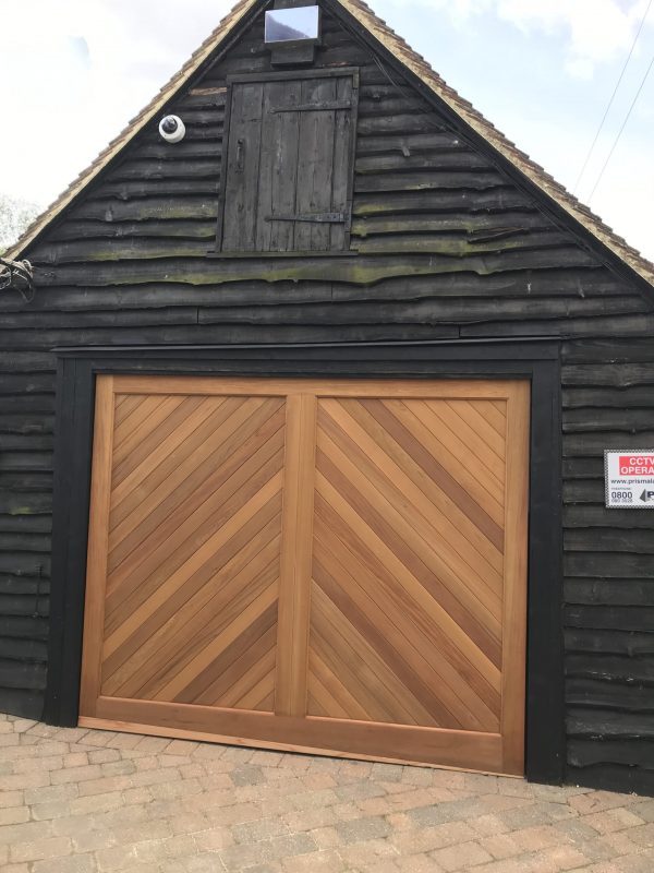 Single wooden garage door about us - JB Garage Doors