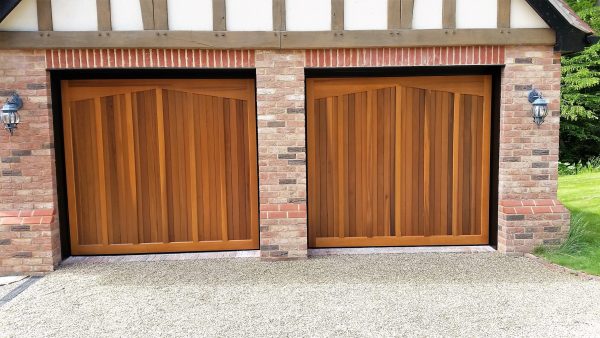 Double wooden garage door maintenance 4 - JB Garage Doors