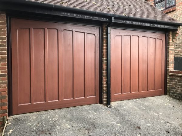 Double wooden garage door maintenance - JB Garage Doors