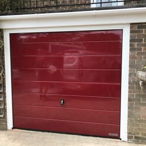 Single red garage door - JB Garage Doors