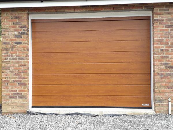light brown wooden sectional garage door