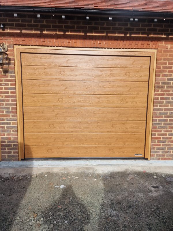 brown wooden sectional garage door