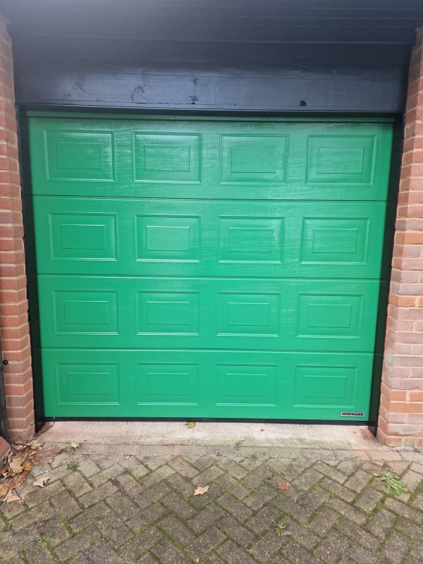 green sectional garage door