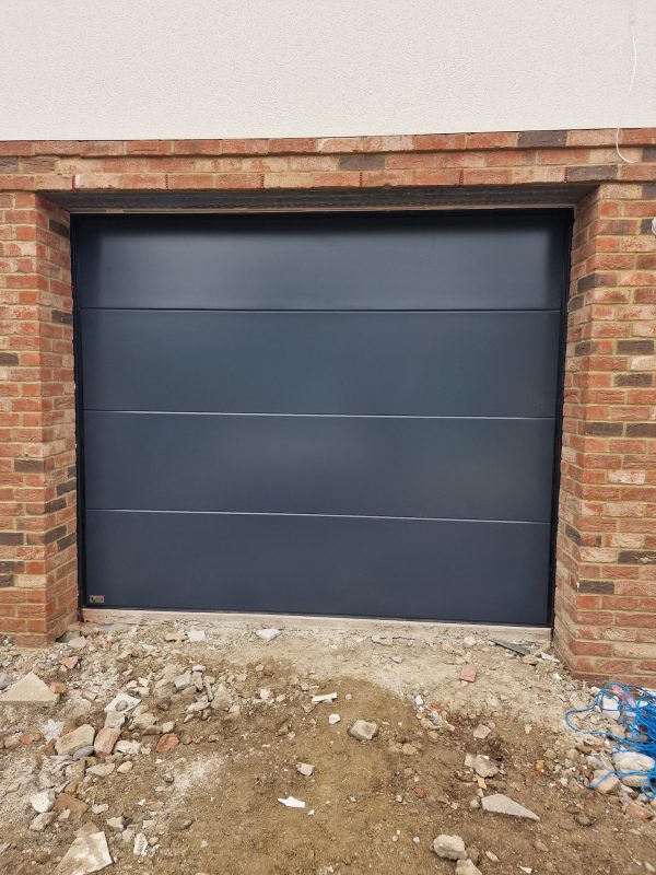 mat black sectional garage door