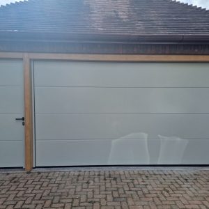 sectional garage door with side door