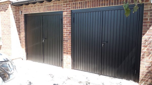 black double side-hinged garage doors