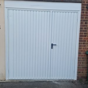 white side-hinged garage door