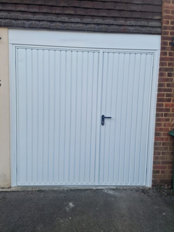white side-hinged garage door