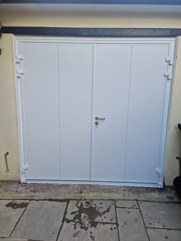 white side-hinged garage doors