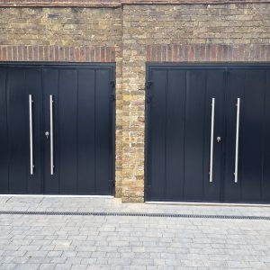 double black side-hinged garage doors