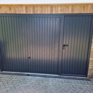 steel garage door black with front entrance door