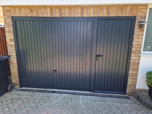 steel garage door black with front entrance door