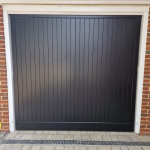 black wooden up and over garage door