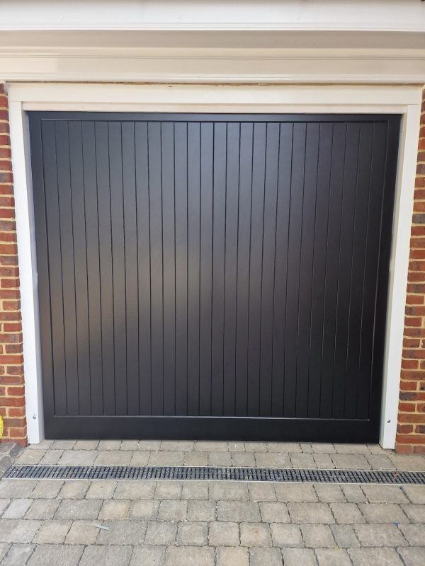 black wooden up and over garage door