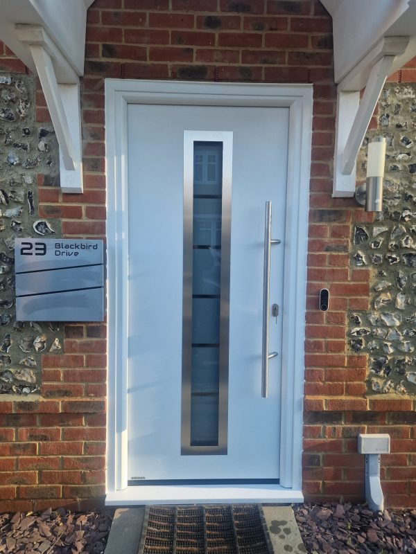blue composite front door with window