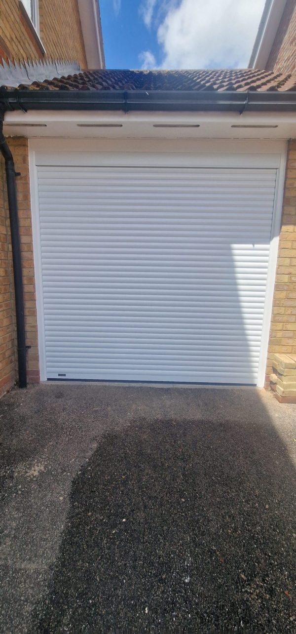 White AlluGuard roller garage door.
