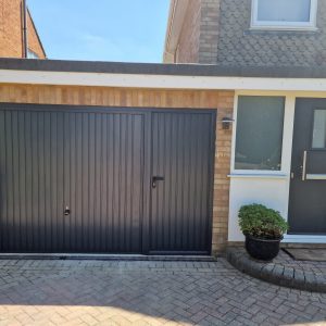 black matching garage & front doors