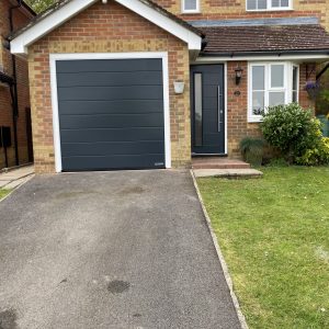 matching garage & front doors with white frame
