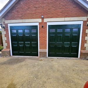 Two black electric garage doors.