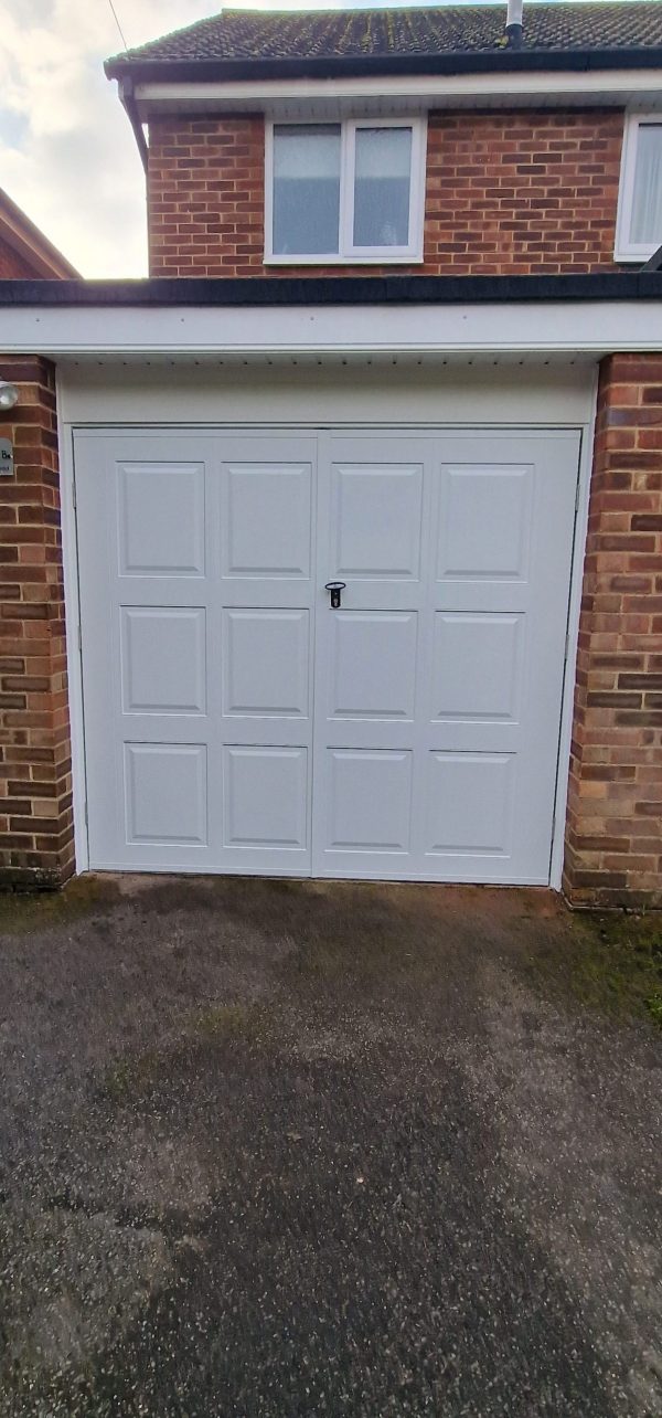 Fort steel side hinged garage door.