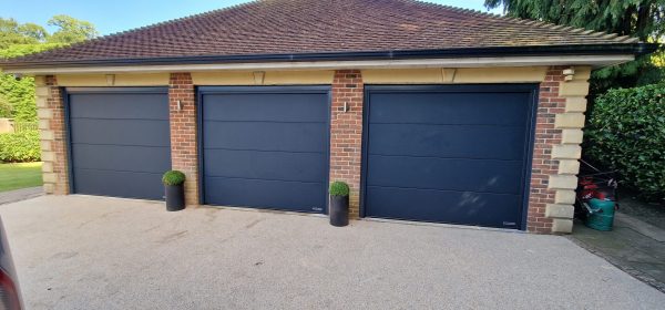 Garage doors in blue colour.