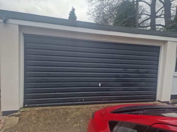 Before replacement of old garage door.