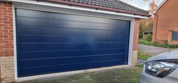 Steel blue Hormann ribbed silkgrain garage door.