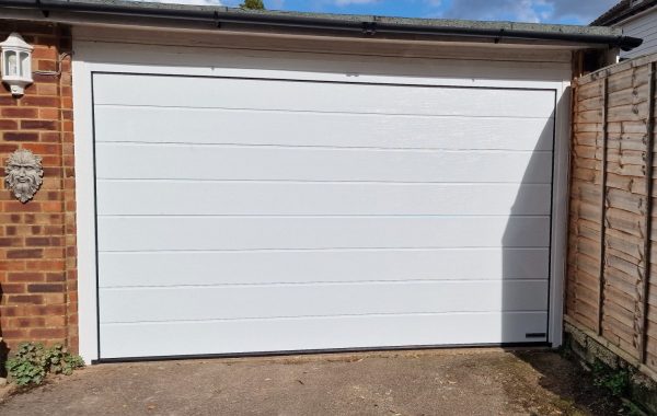 Hormann woodgrain white garage door.