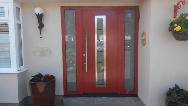 Red front door with windows.