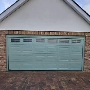 Teckentrup georgian insulated garage door in Chartwell Green.