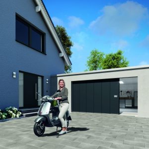 Modern white house with a Hormann sliding garage door.