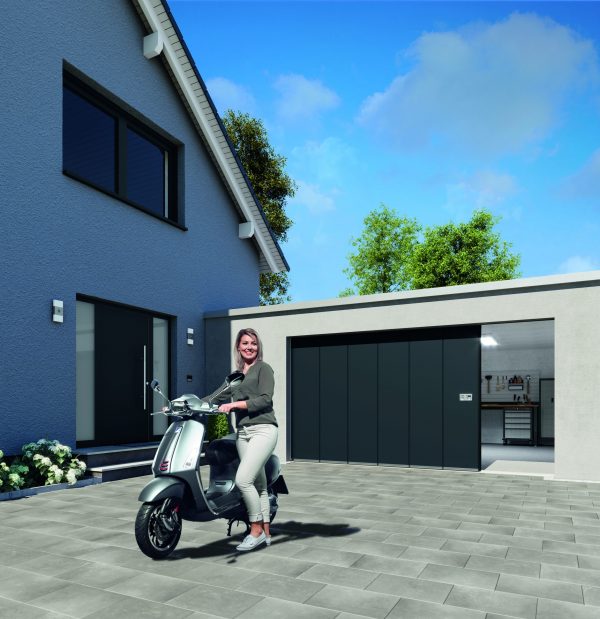Modern white house with a Hormann sliding garage door.
